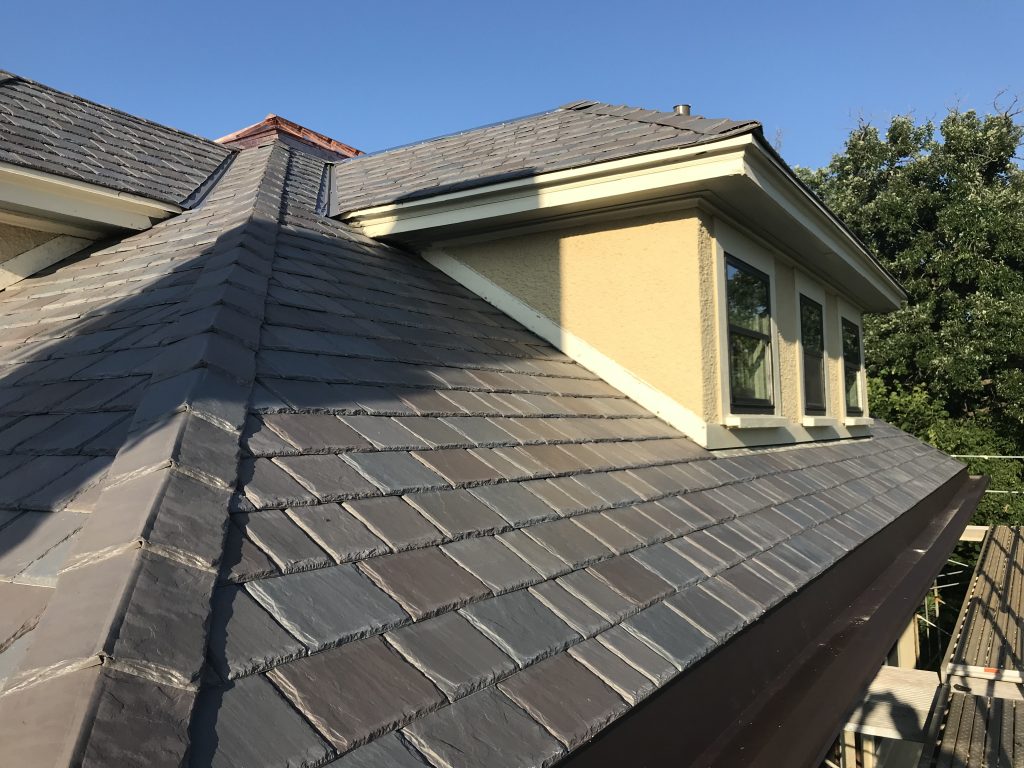 Pigeon nesting spot on residential roof needing professional pigeon nest removal